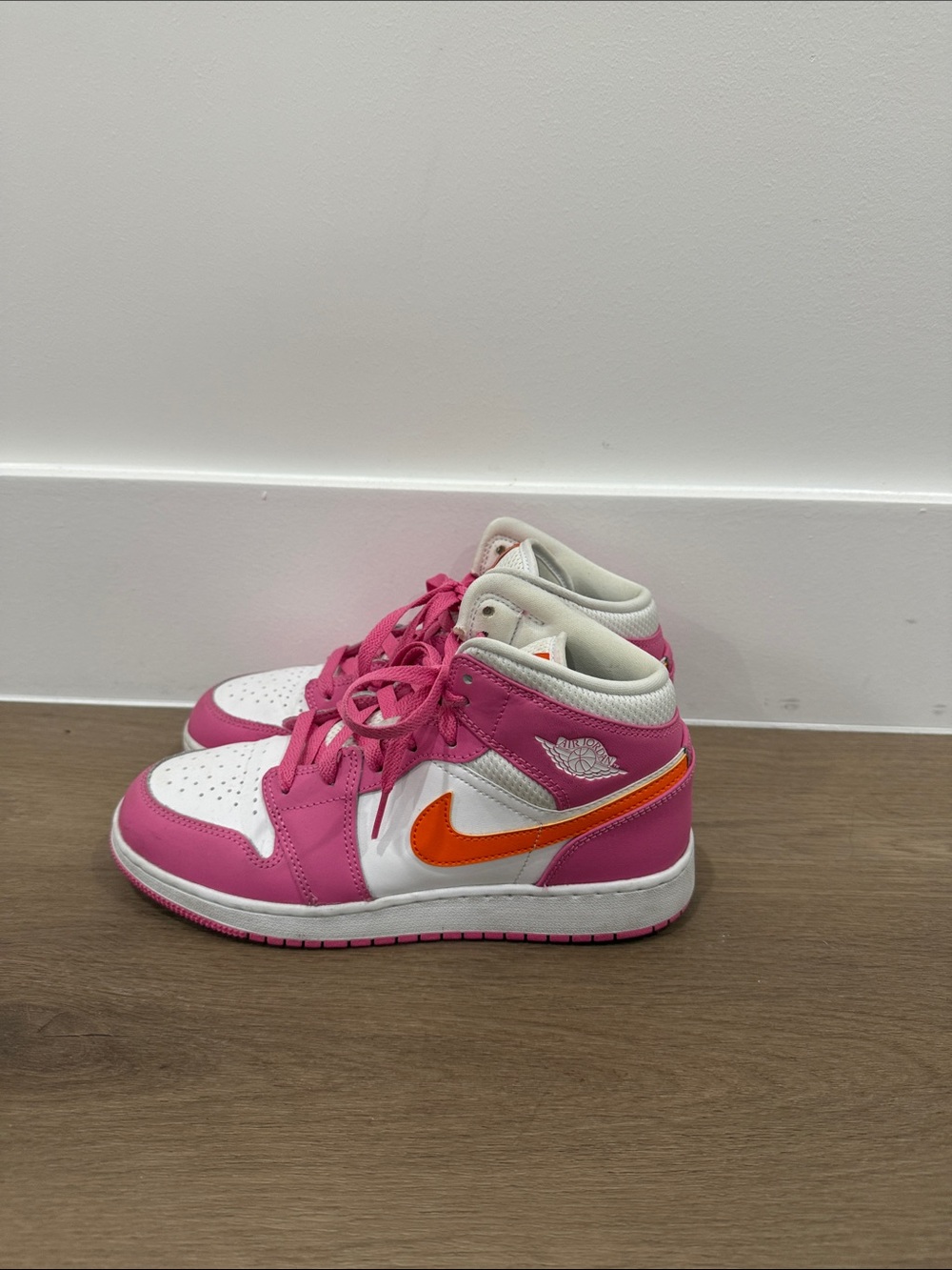 Pink and orange Jordan 4 size 5.5 youth